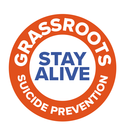 Red circle with the words 'GRASSROOTS SUICIDE PREVENTION' written around the circle. 'STAY ALIVE' is written inside the circle in blue.